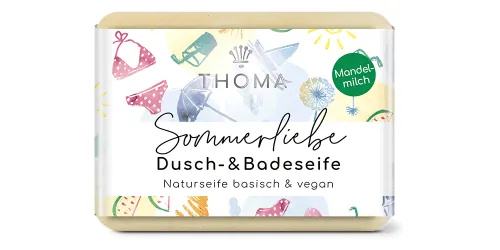 rechteckige beigeSeife mit bunter sommerlicher Verpackung und Aufschrift Sommerliebe, vegane Mandelmilch Seife von der Naturseifen Manufaktur Uckermark.