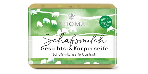 rechteckige, grünlich-gelbe Seife mit grüner Verpackung und Aufschrift Schafsmilch, Gesichts und Körperseife mit Hanföl von der Naturseifen Manufaktur Uckermark.