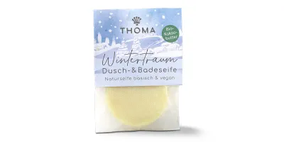 Wintertraum Dusch- & Badeseife von THOMA – basische und vegane Naturseife mit Bio-Kakaobutter. Dezente Verpackung im winterlichen Design, ideal für die Pflege in der kalten Jahreszeit.
