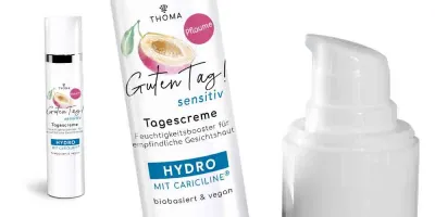 Eine Flasche der Tagescreme Guten Tag Sensitiv Pflaume von THOMA mit der Kennzeichnung Hydro mit Cariciline Die Creme ist biobasiert und vegan bietet einen Feuchtigkeitsbooster für empfindliche Gesichtshaut Nahaufnahme des Pumpspenders